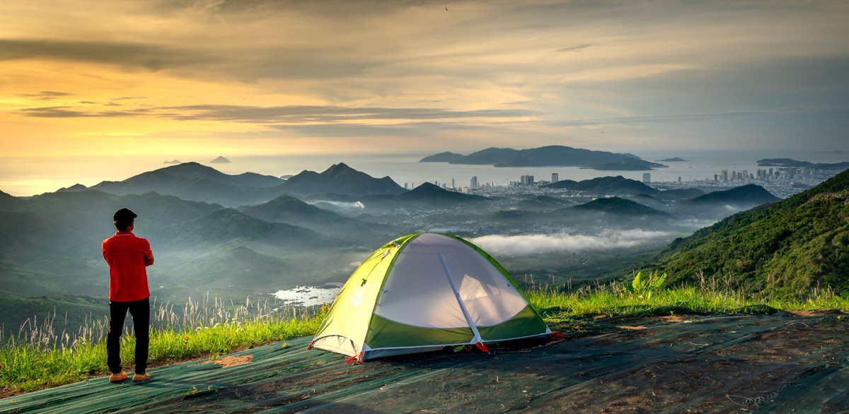 North Island Camping Ground with Trees and Mountains